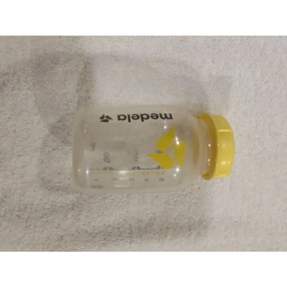 10 Baby Medela Clear and Yellow Breast Milk Storage Bottles